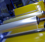 Click for full size image: Plastic Laminator With a Bright Yellow Paint Film